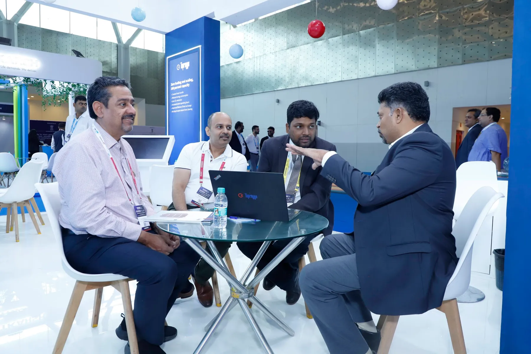 Industry professionals discussing energy solutions at the 2025 exhibition