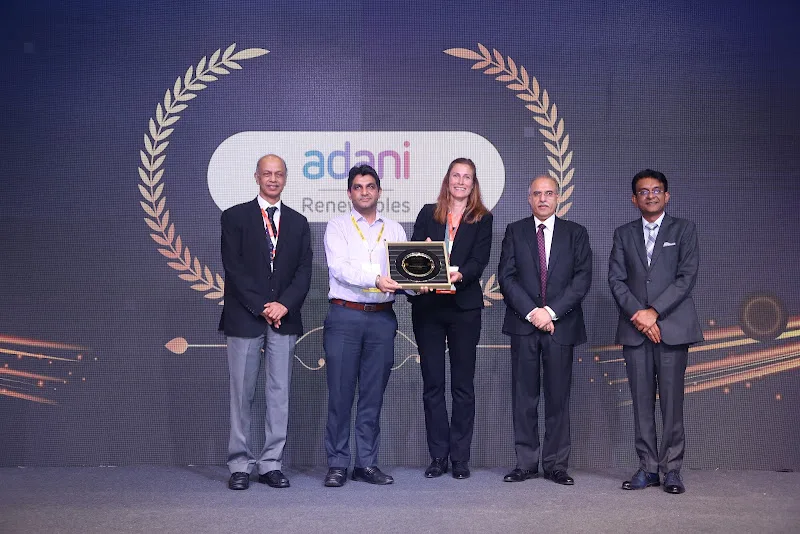 Recipients holding a trophy at the 2024 awards ceremony