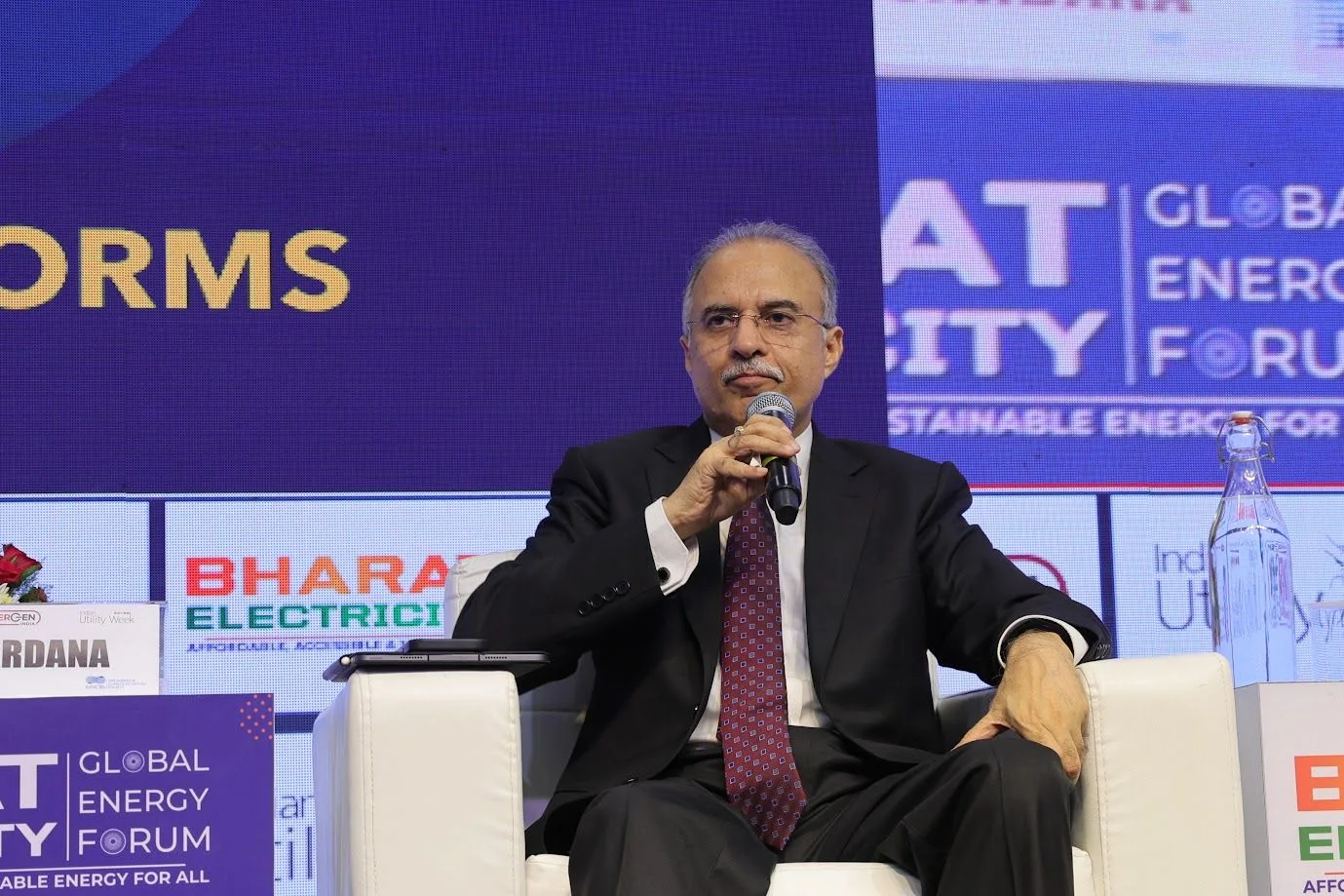 Speaker sharing insights on stage at Bharat Electricity